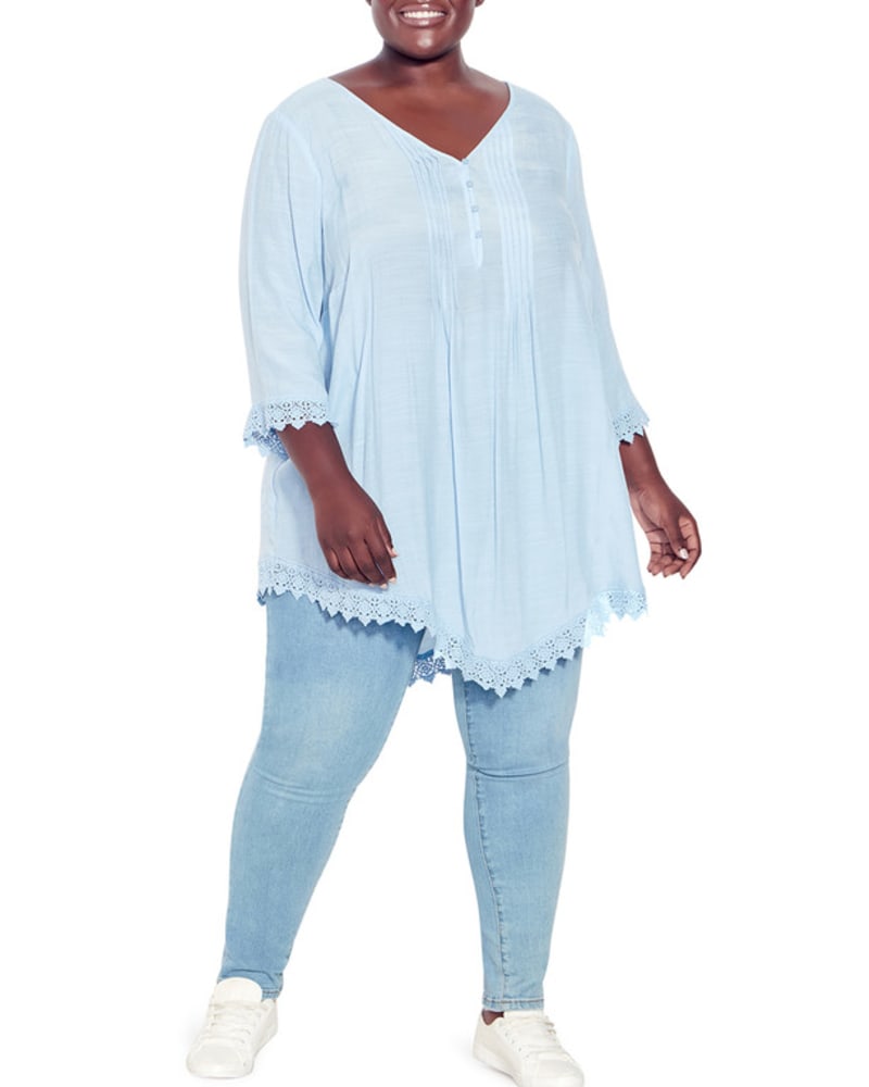 Front of a model wearing a size 14 Ellie Pintuck Lace Top in Powder Blue by avenue. | dia_product_style_image_id:280384